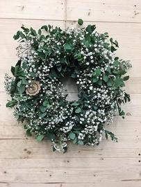 Wreath from white gypsophila and eucalypthus